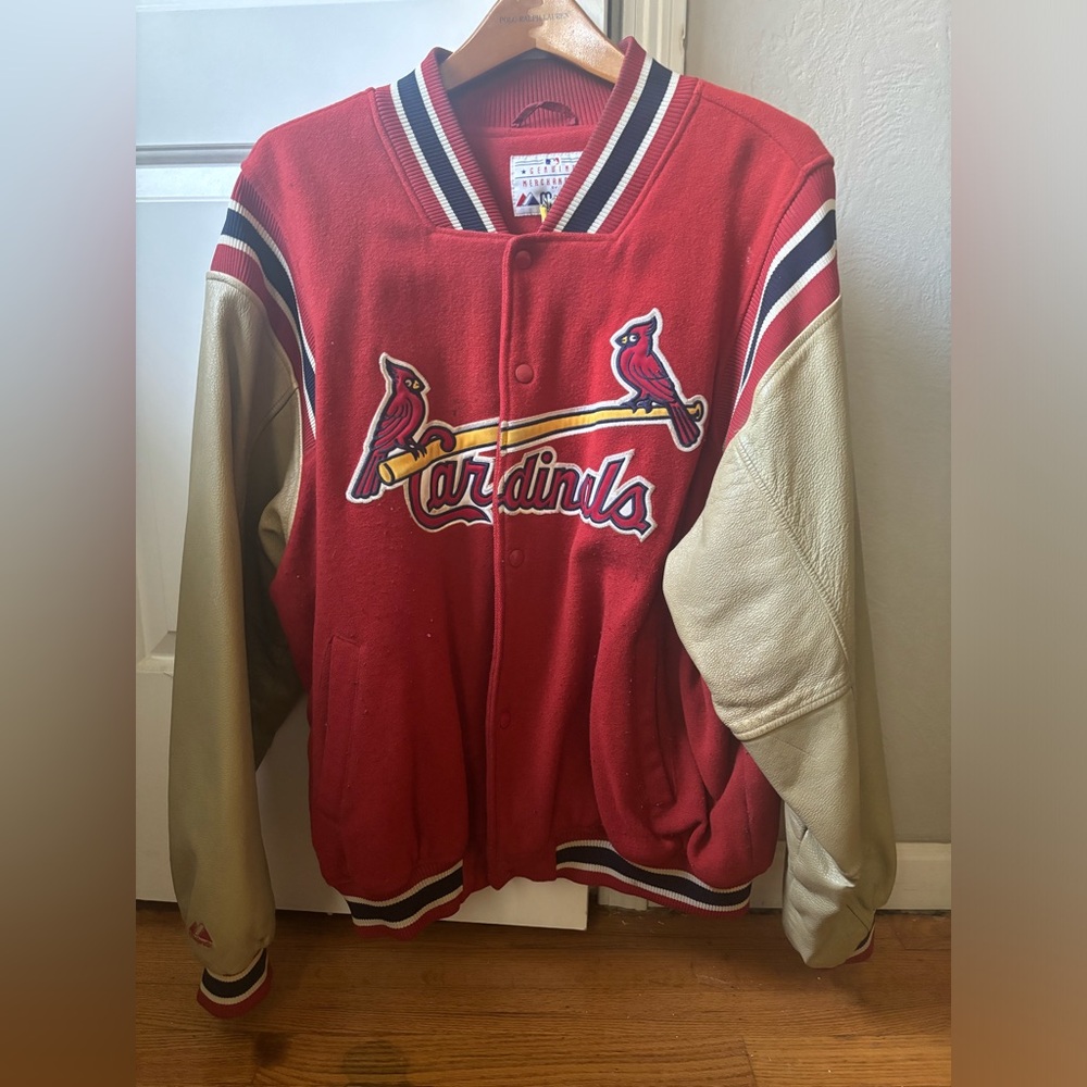 St Louis Cardinals bomber…… red with peanut butter leather sleeves.